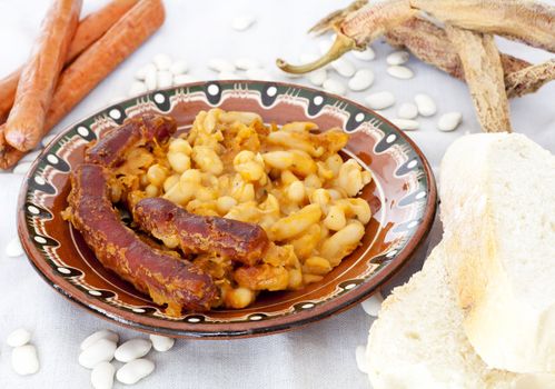 Traditional Macedonian food Tavce Gravce on clay plate