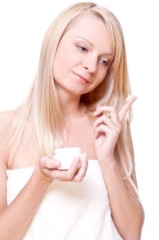 beautiful woman with cream on a white background