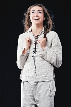 Young woman in white suit, Isolated on black background