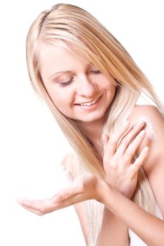 beautiful woman with cream on a white background