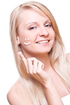 beautiful woman with cream on a white background