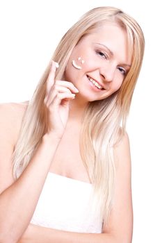 beautiful woman with cream on a white background