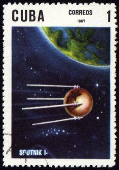 CUBA - CIRCA 1967: A stamp printed in Cuba shows flight of first soviet spaceship "Sputnik-1", circa 1967