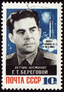 USSR - CIRCA 1968: A stamp printed in USSR shows soviet cosmonaut Georgy Beregovoy and spaceship Soyuz, circa 1968