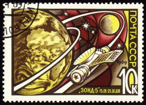 USSR - CIRCA 1969: A stamp printed in USSR shows flight of soviet automatic spaceship "Zond-5" to the Moon, circa 1969