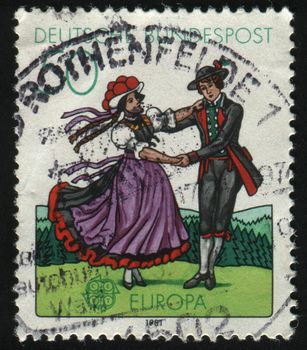 GERMANY- CIRCA 1981: stamp printed by Germany, shows  South German couple dancing in regional costumes, circa 1981.