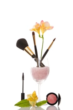 cosmetics and flower on white background, beauty concept