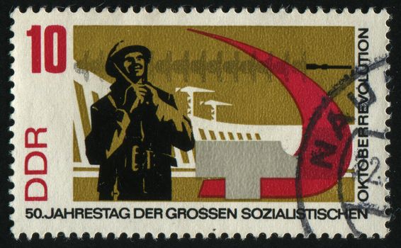 GERMANY- CIRCA 1967: stamp printed by Germany, shows Worker and Symbols of Electrification, circa 1967.