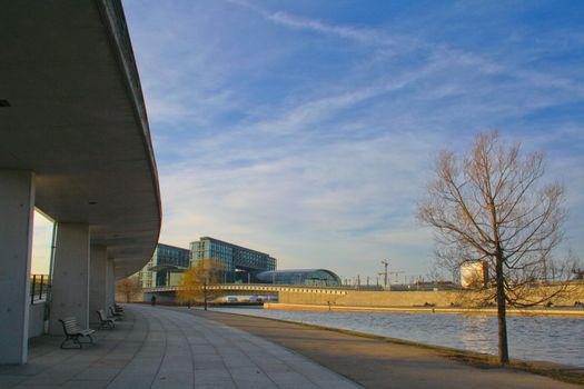 The bank of the river on a tranquil summer evening in the heart of the city.