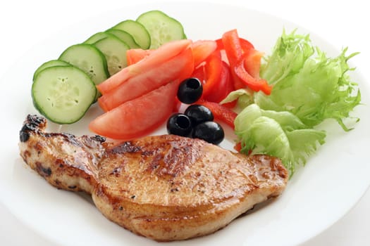 fried pork with salad