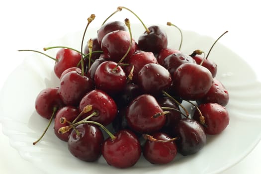 cherry on an white plate