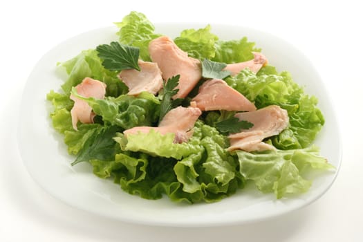 salmon salad on white plate