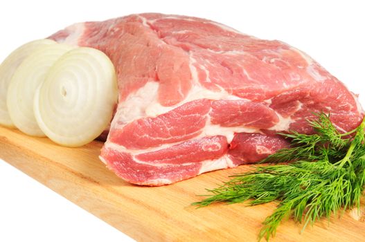 Piece of pork for roasting on a wooden board. Isolated on white.