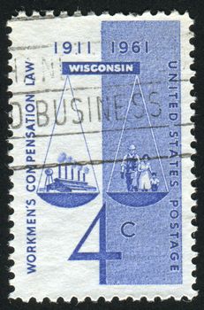 UNITED STATES - CIRCA 1961: stamp printed by United states, shows Scales of Justice Factory, Worker and Family, circa 1961