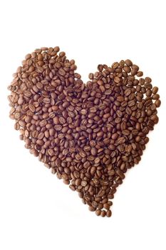 Coffee beans as heart on white