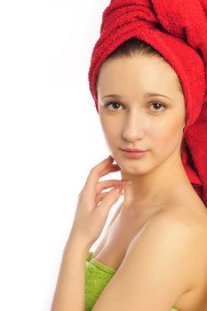  beautiful smiling young woman in towel on white background