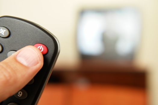 Television screen with tv remote control  in foreground.....