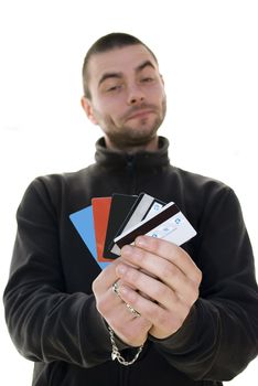 handsome young man offering credit cards isolated