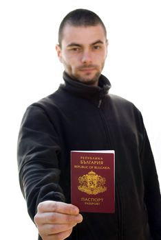 young man holding his passport isolated on white