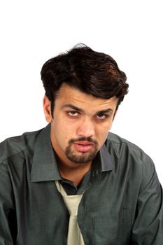 A portrait of a tired Indian businessman, on white studio background.