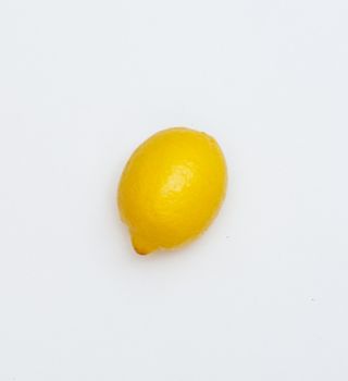 face made of fruits on wooden background