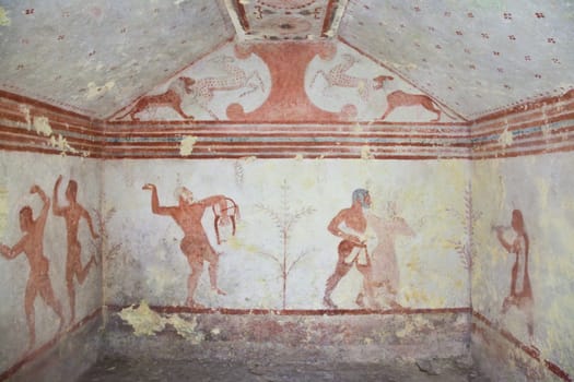 Tarquinia, Italy, around 470 B.C. Via a narrow corridor leading downstair one has access to the rectangular burial room with a sloping ceiling