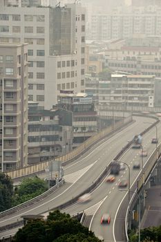 Air pollution in modern city with cars on highway in Taipei, Taiwan, Asia.