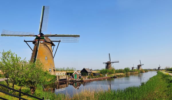 Holland. Vertical Panorama of canals and water mills