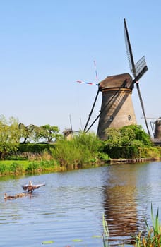 Holland. Vertical Panorama of canals and water mills