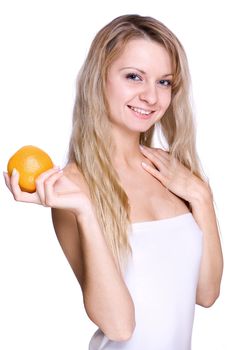 smiling young haelthy woman holding the orange in her hand