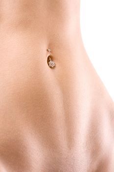 sexy stomach with piercing on a white background
