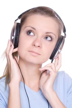 Isolated smiling young girl listening to music