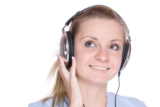 Isolated smiling young girl listening to music