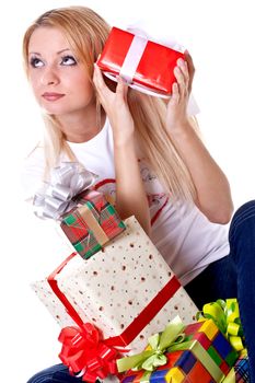 beautiful woman with holiday gift on a white background