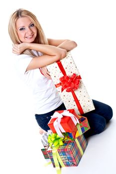 beautiful woman with holiday gift on a white background