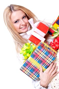 beautiful woman with holiday gift on a white background