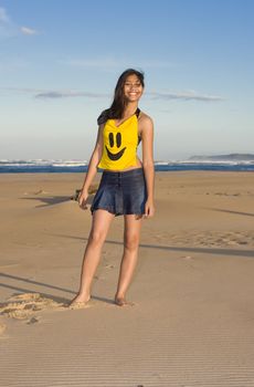 Smiling model wearing a happy face outfit