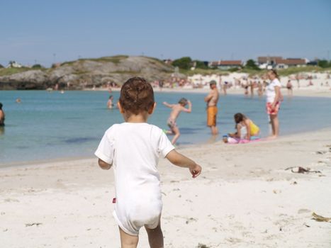 baby and kids on beach