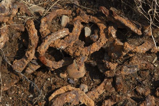 discarded horse shoes from a forge