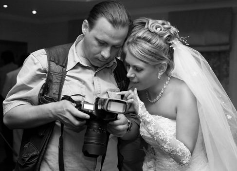 The beautiful bride and the photographer