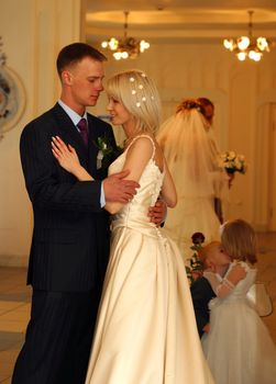 Bride and groom and their children before ceremony