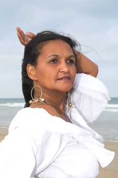 An Ethnic Model posing at the beach