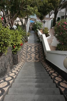 steps down to a lanzarote coastal beach