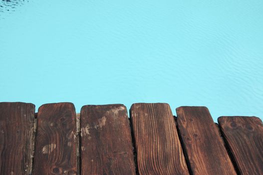 standing at the edge of the pool side