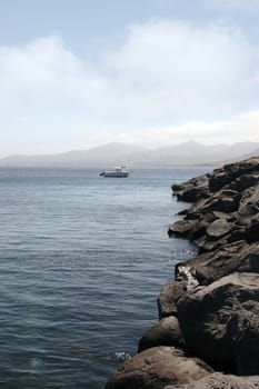 a motor boat in clear blue waters