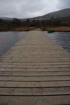 a wooden jetty over carragh lake county kerry ireland