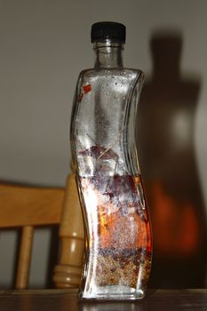 sleek slender bottle of oil