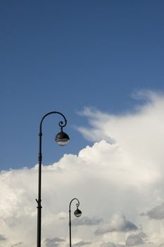 Two lanterns and white clouds