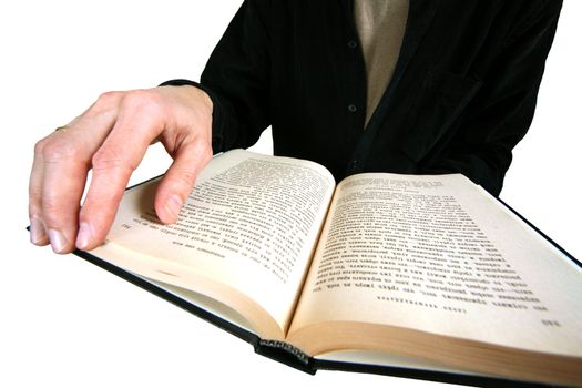 The male hand holds the open book