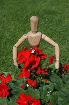 art model man tending to his flowers